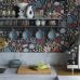 Фрагмент интерьера скандинавской кухни декорированный цветочными темными обоями Tradgarden артикул 2095 из каталога Swedish Designers от Borastapeter